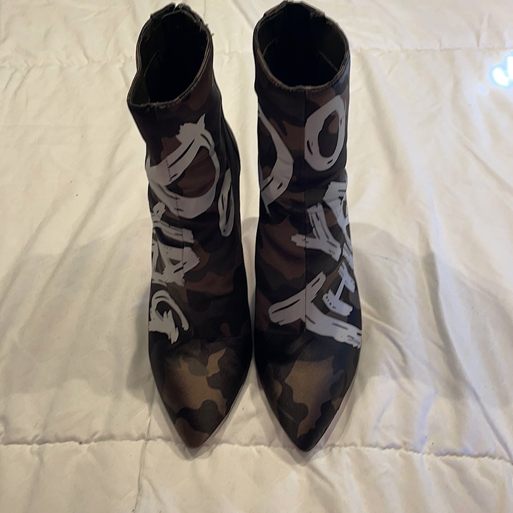 Fun Aldo camo above the ankle boots.